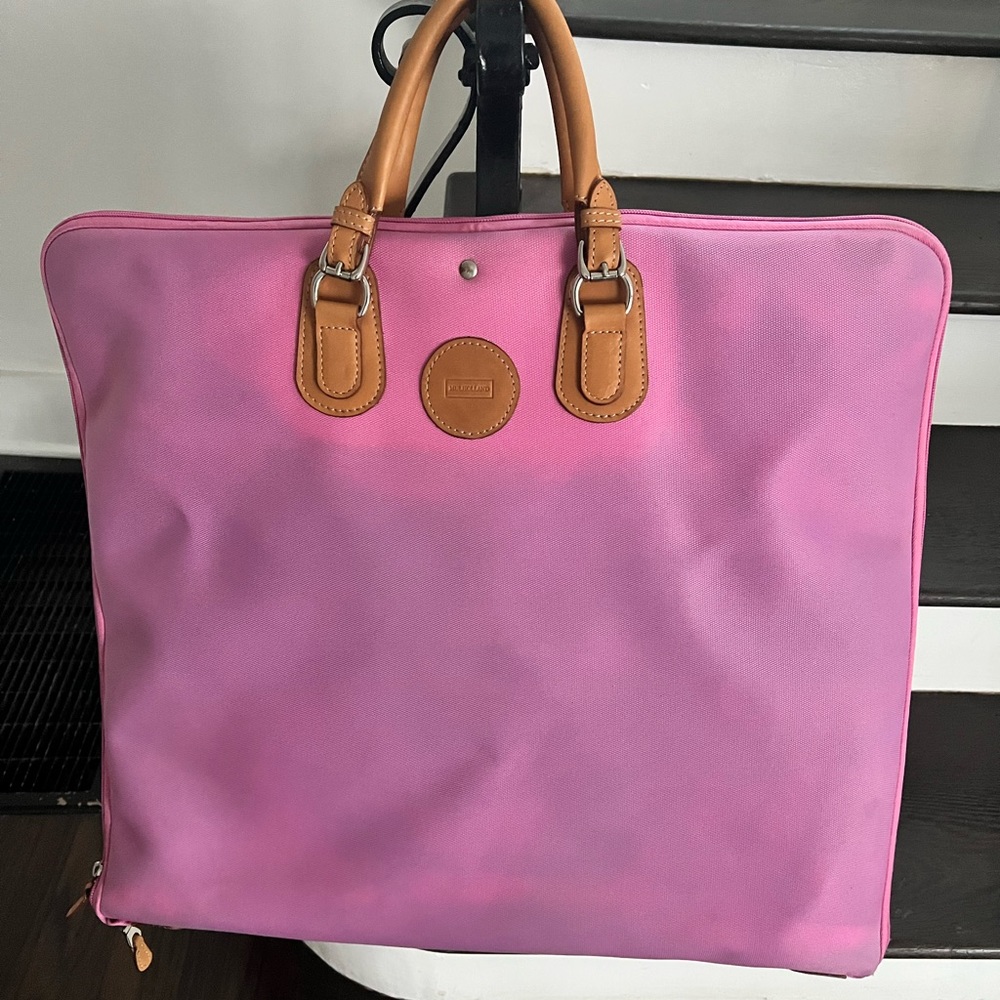 Mulholland garment bag. 2”x3.7”